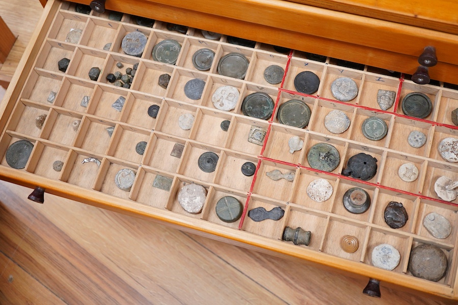 A collection of mainly Medieval to 19th century bronze and lead imperial circular trade weights, with some Viking and Roman examples, stamped with Royal Cyphers, weights, the dagger assay mark for London, the ewer mark,